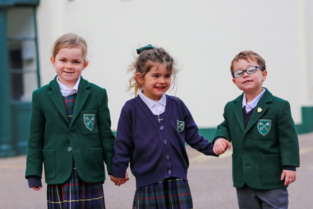Pupils at St Peter’s Prep Private School holding hands