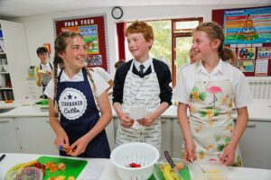 Students prepping food using the Food technology facilities