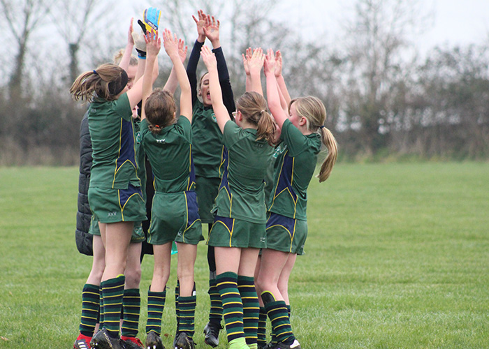 A team celebrating a sports victory