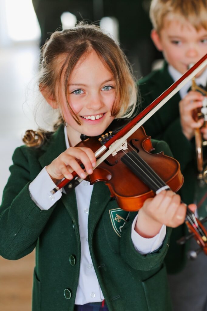 A pupil at St Peter's Prep playing the violin