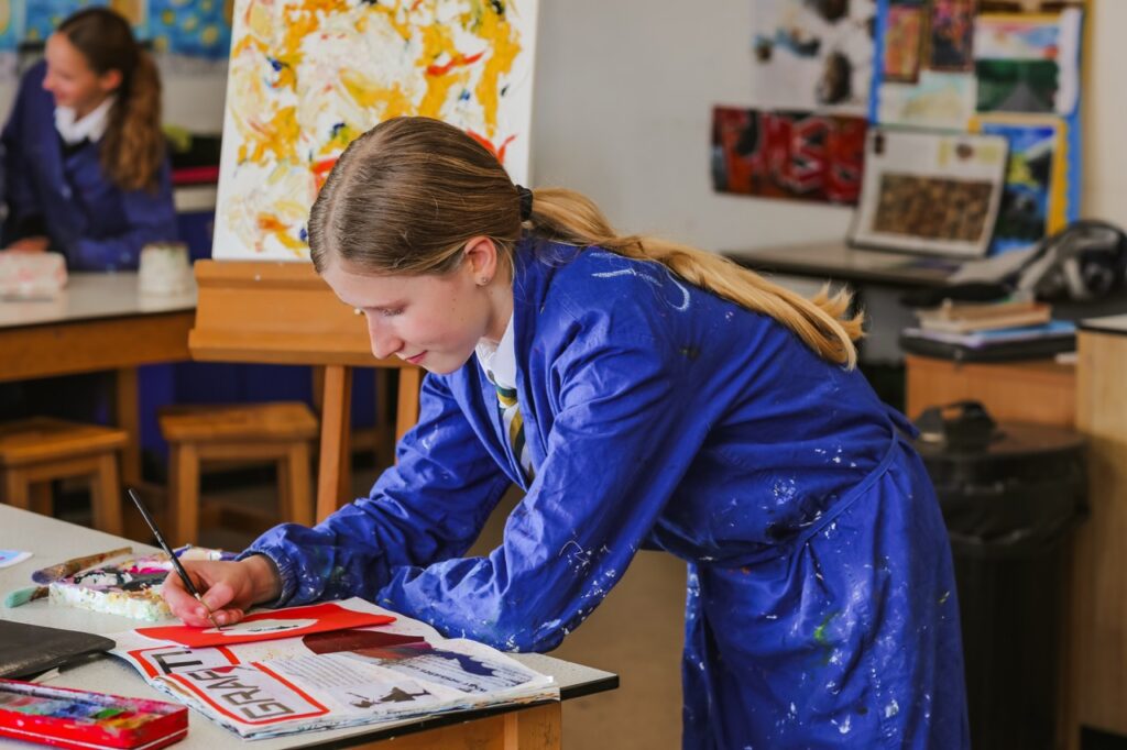 A pupil painting during an art class at St Peter’s Prep