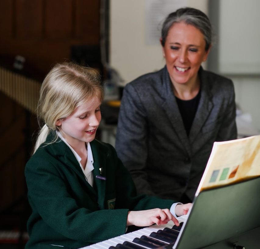 A pupil learning the piano at St Peter’s Prep