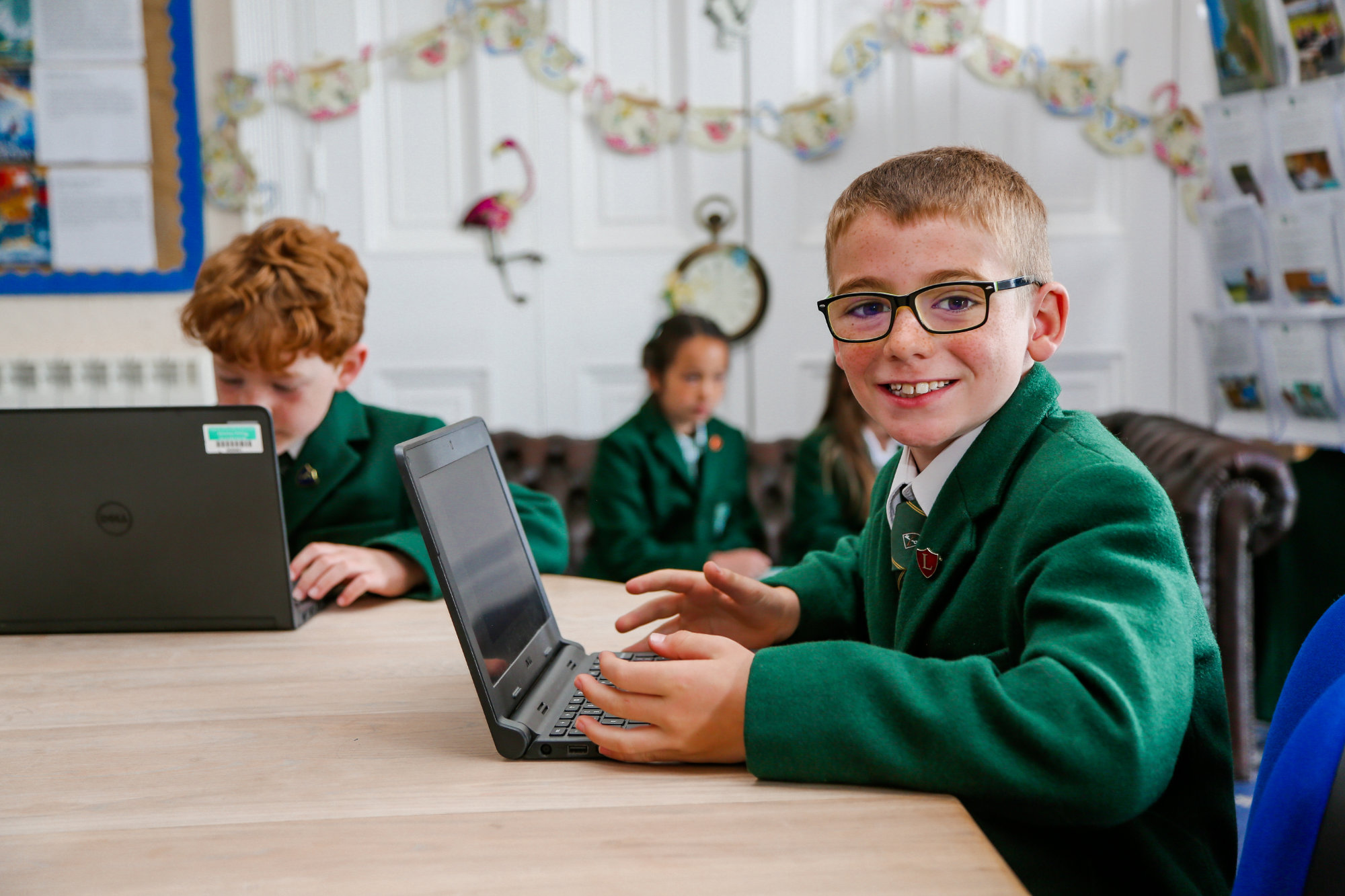 A school student on a laptop