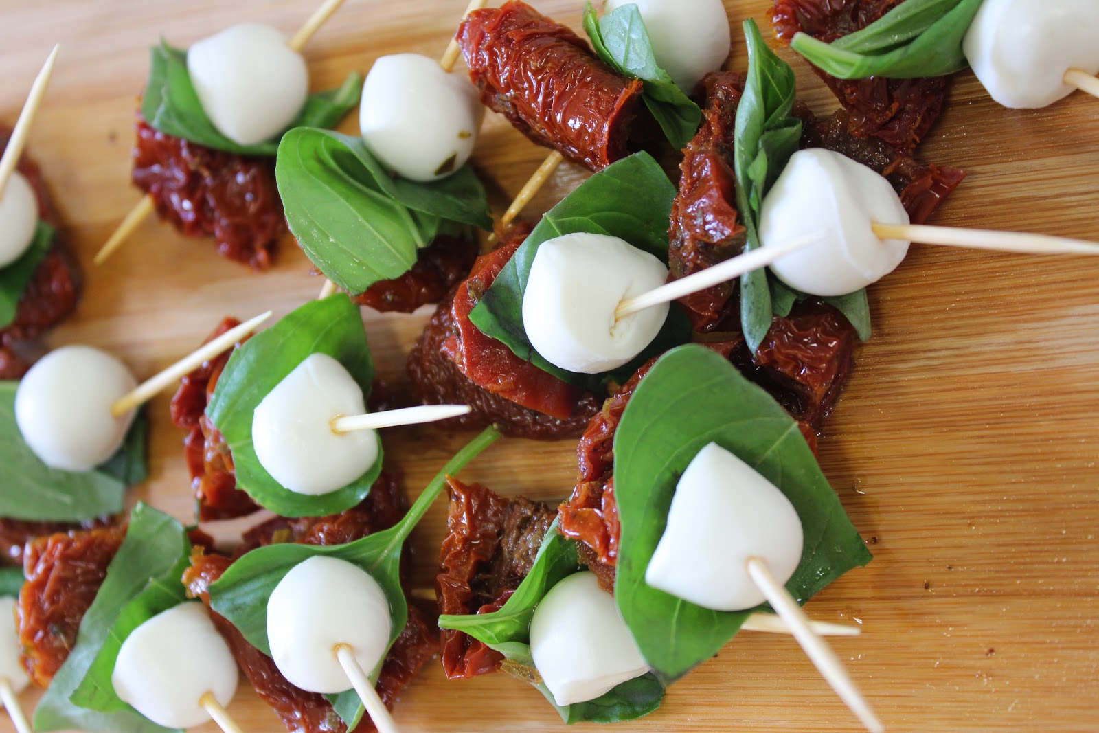 Sun-dried tomatoes, mozzarella & basil canapes