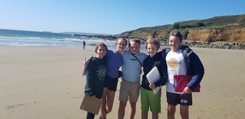 A group of students on the beach