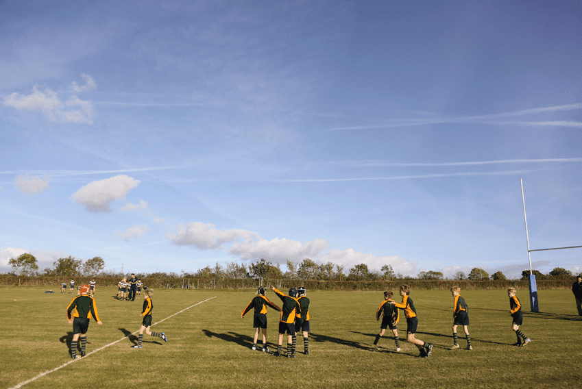 team playing rugby sport