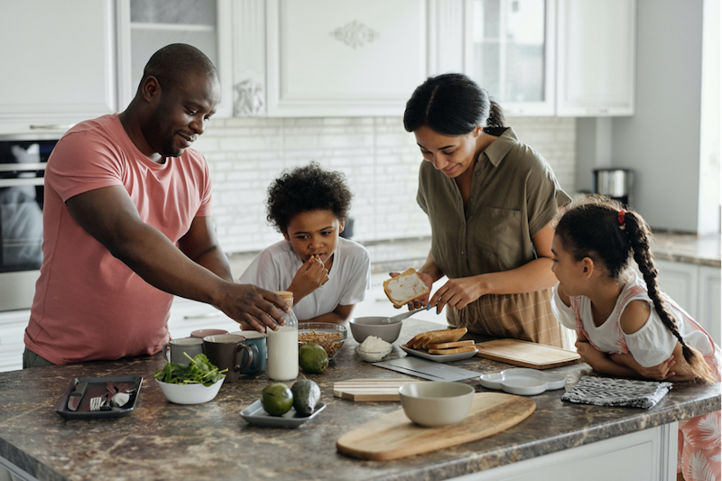 A family spending time together in a kitchen