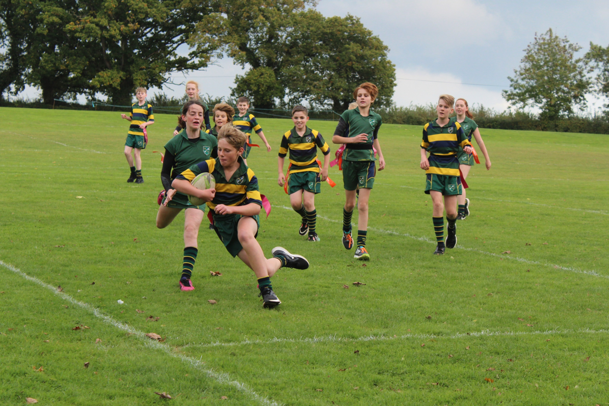 Children playing rugby