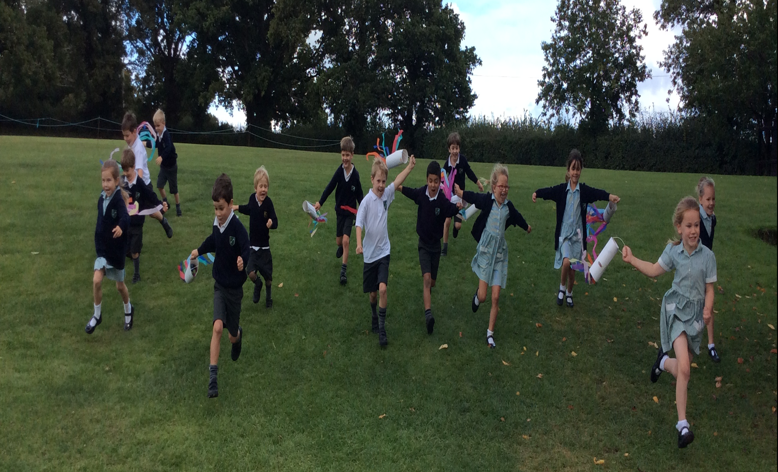 Children running down a hill