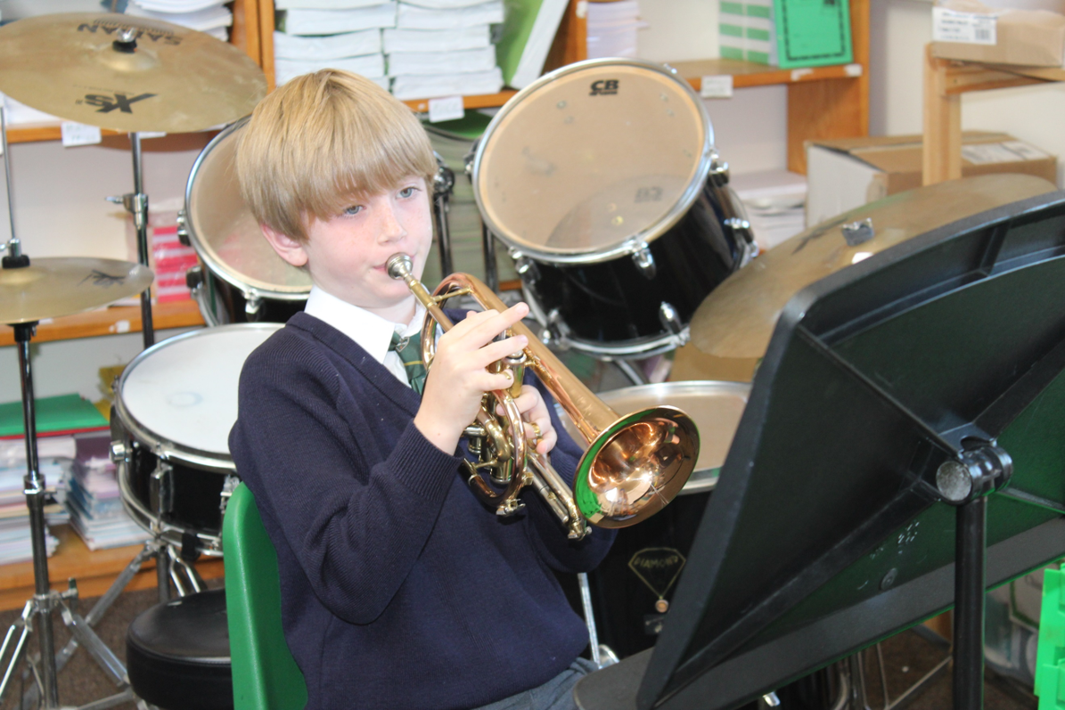 A child playing instruments