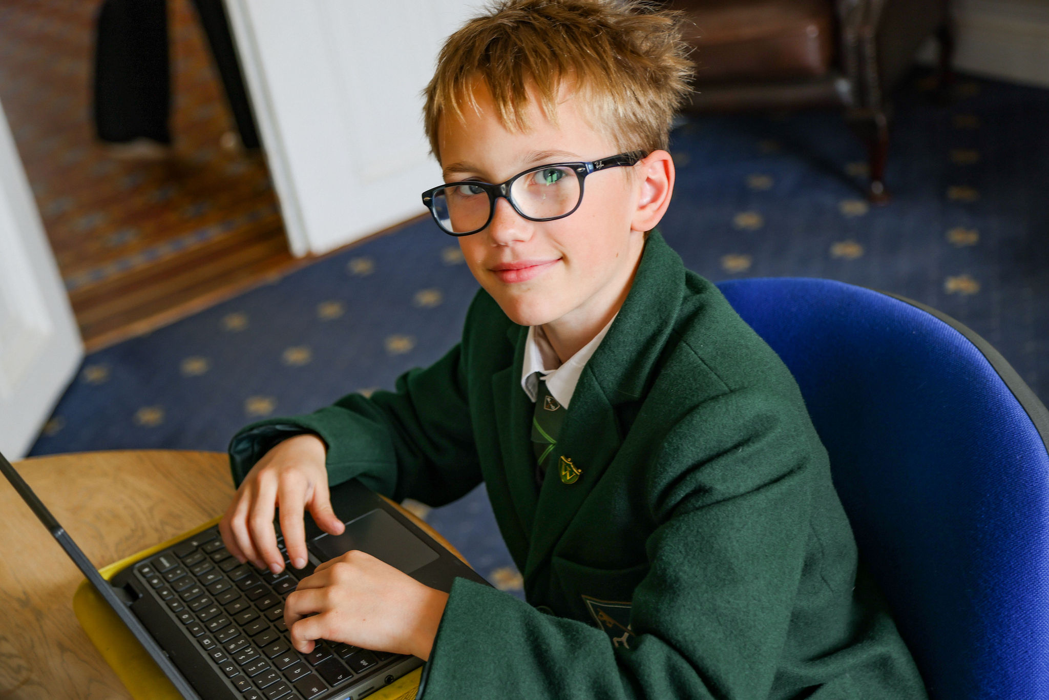 A St Peter’s Prep pupil using a laptop