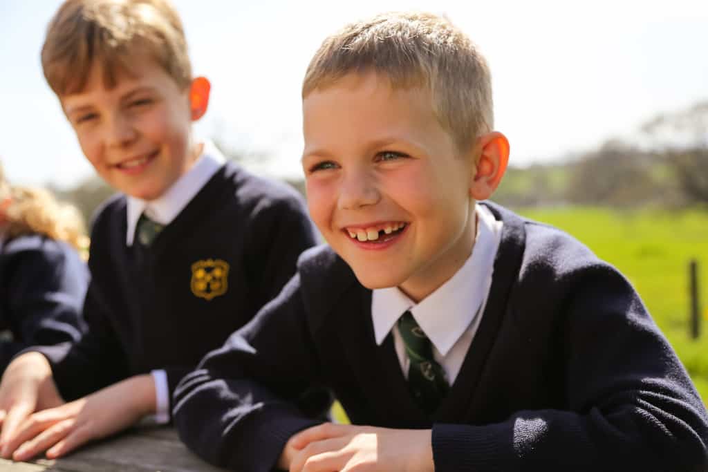 boy laughing at school