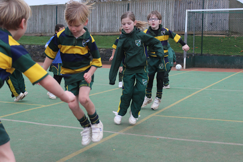 St Peter's Prep students jumping on the court 