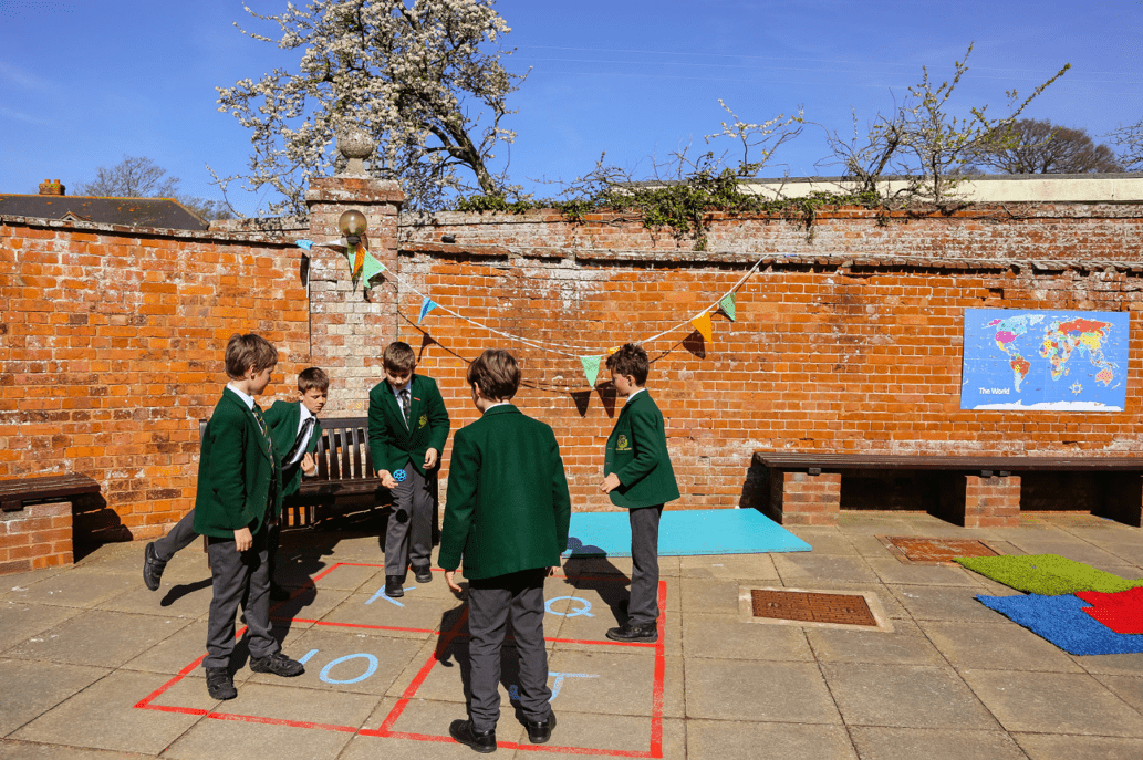 group of children playing in the sun