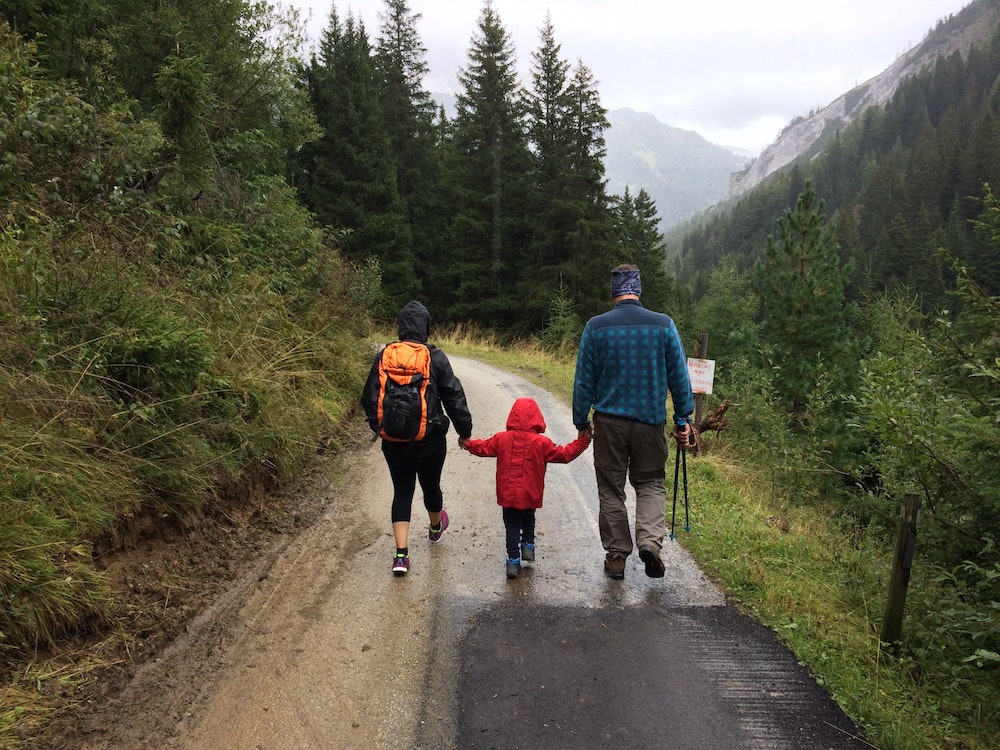 A family walking together in a wood