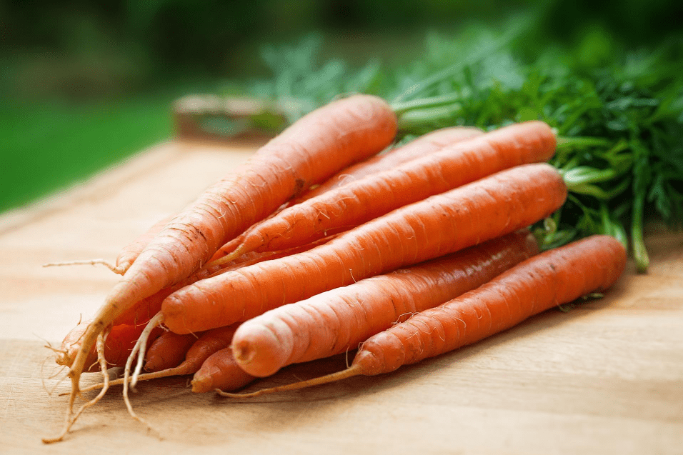 Carrots on a chopping board.