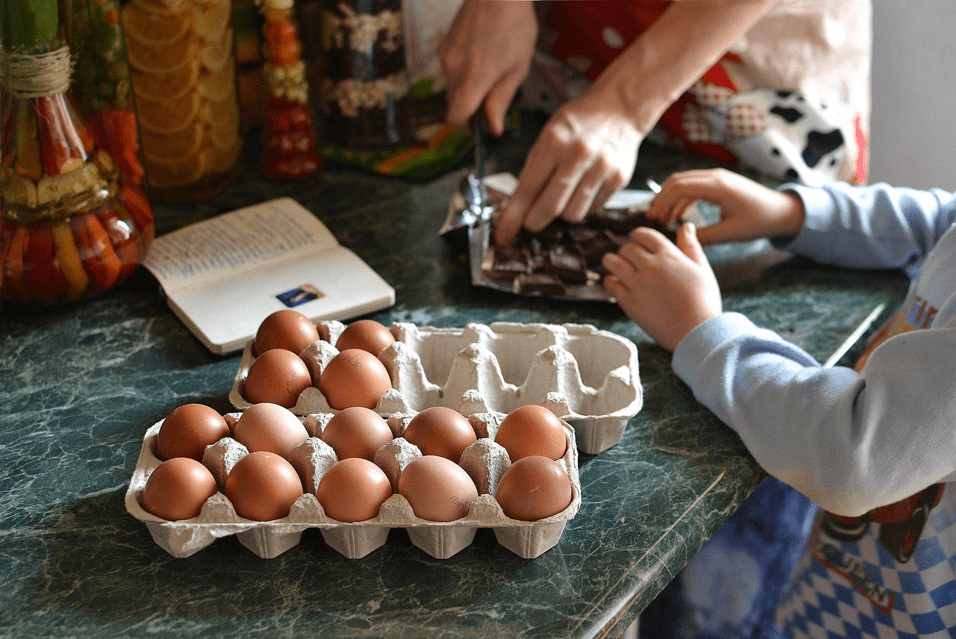 A child helping to cook.