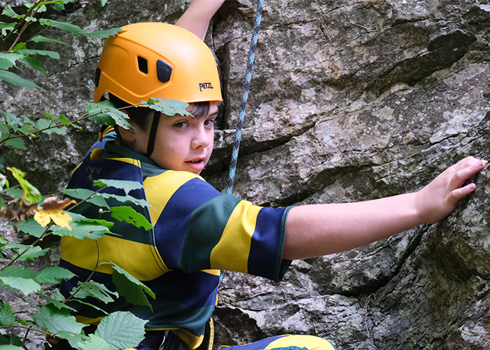 A st peter's student climbing during outdoor learning