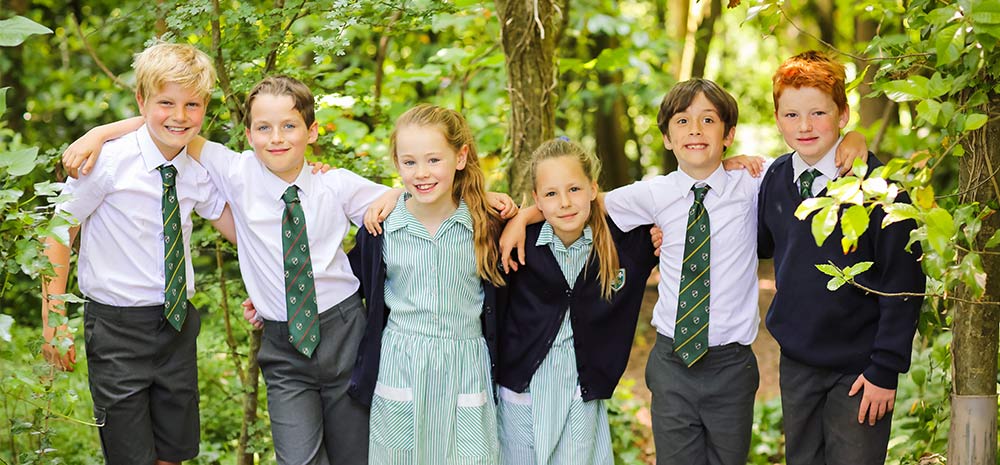 St Peter's pupils posed for camera in the woodland