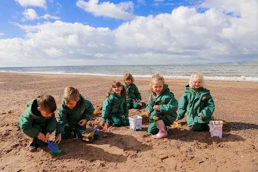 children having fun at the beach