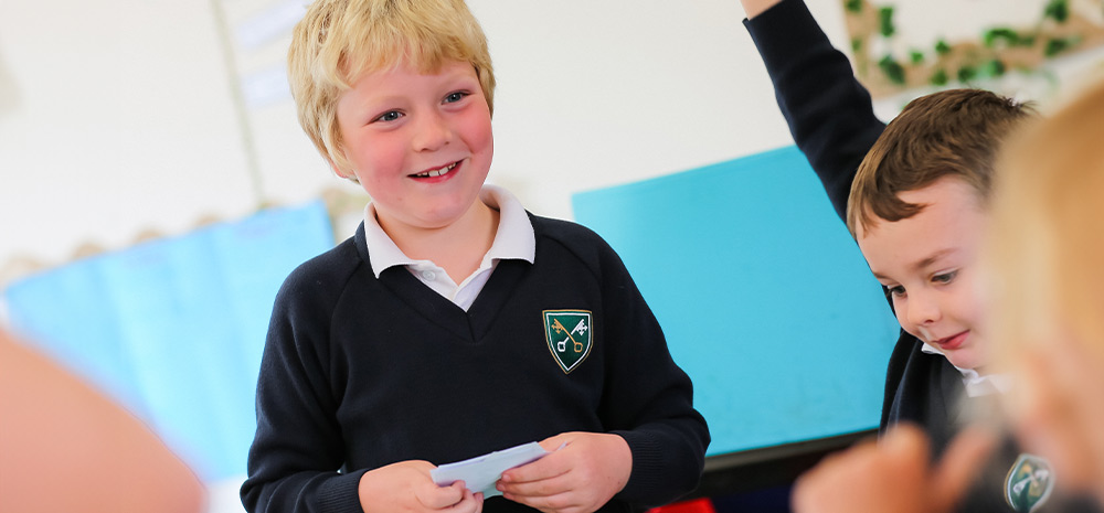 Student smiles to his classmate