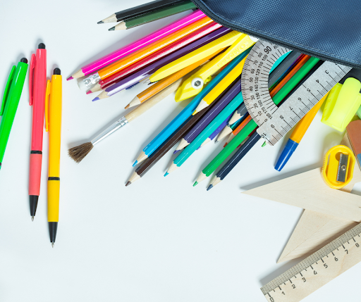 Pens and equipment pouring out of a pencil case