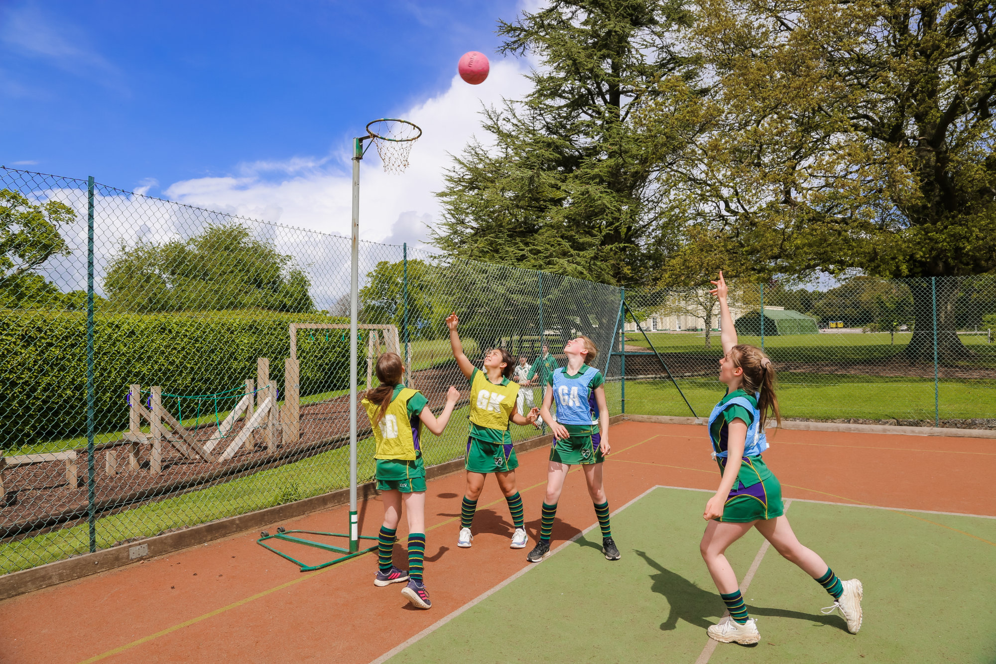 A team of students playing netball