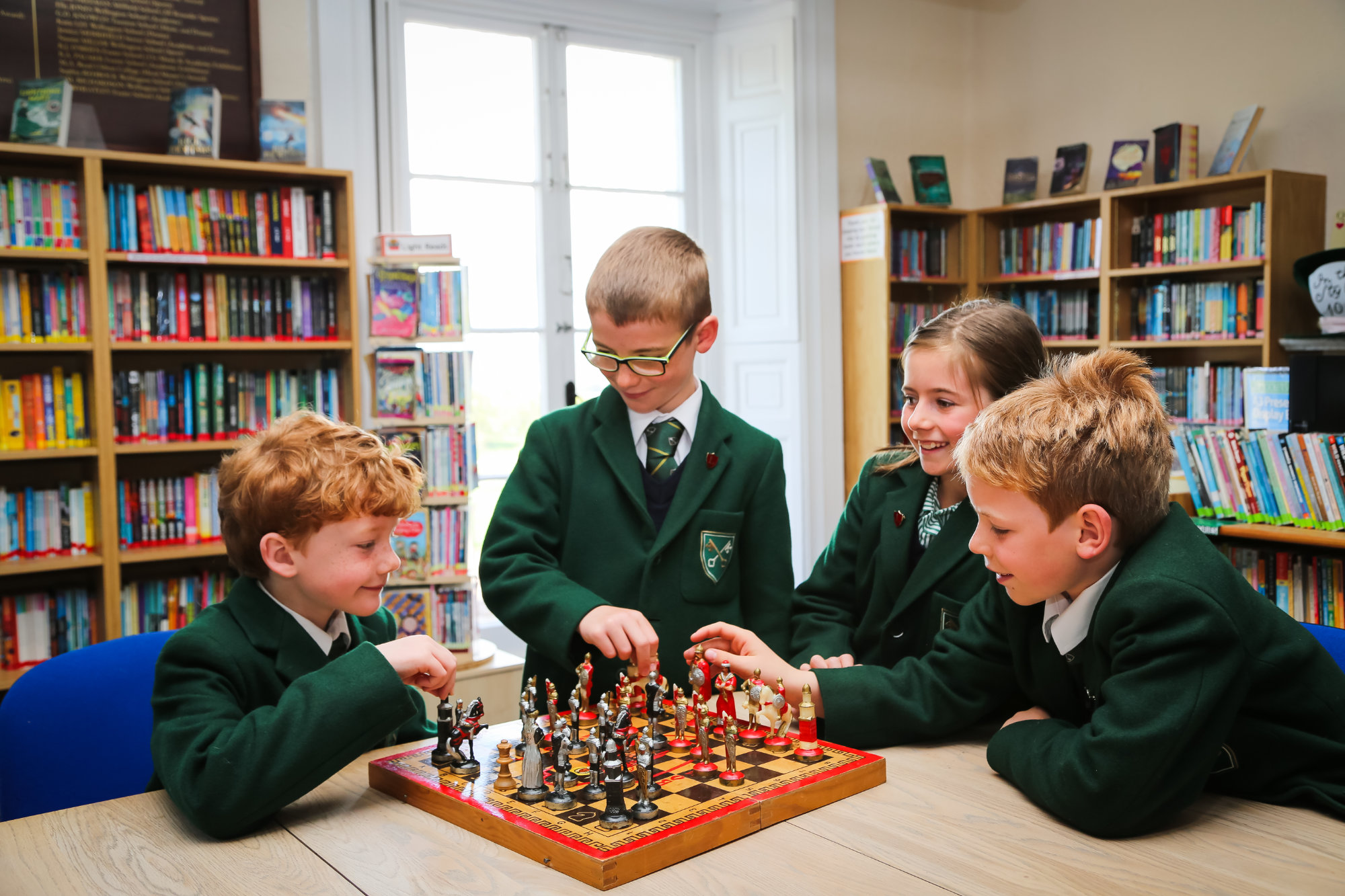 A group of pupils playing chess