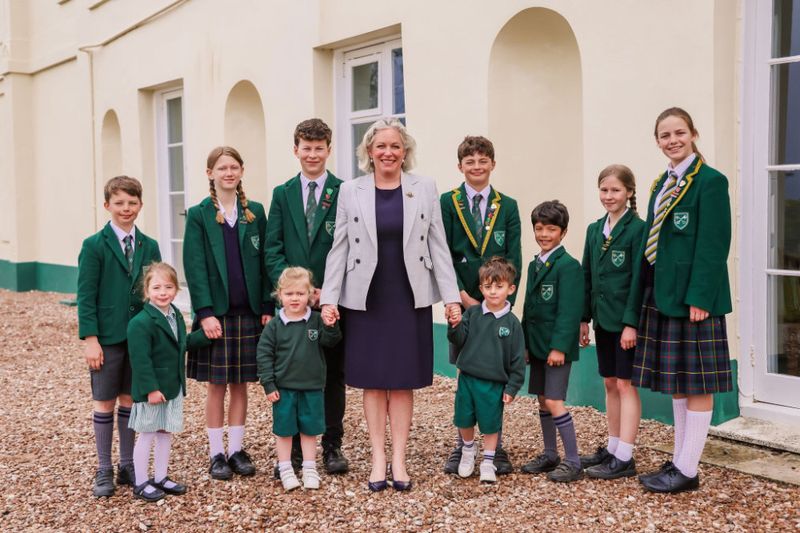 St Peter’s pupils with their Head